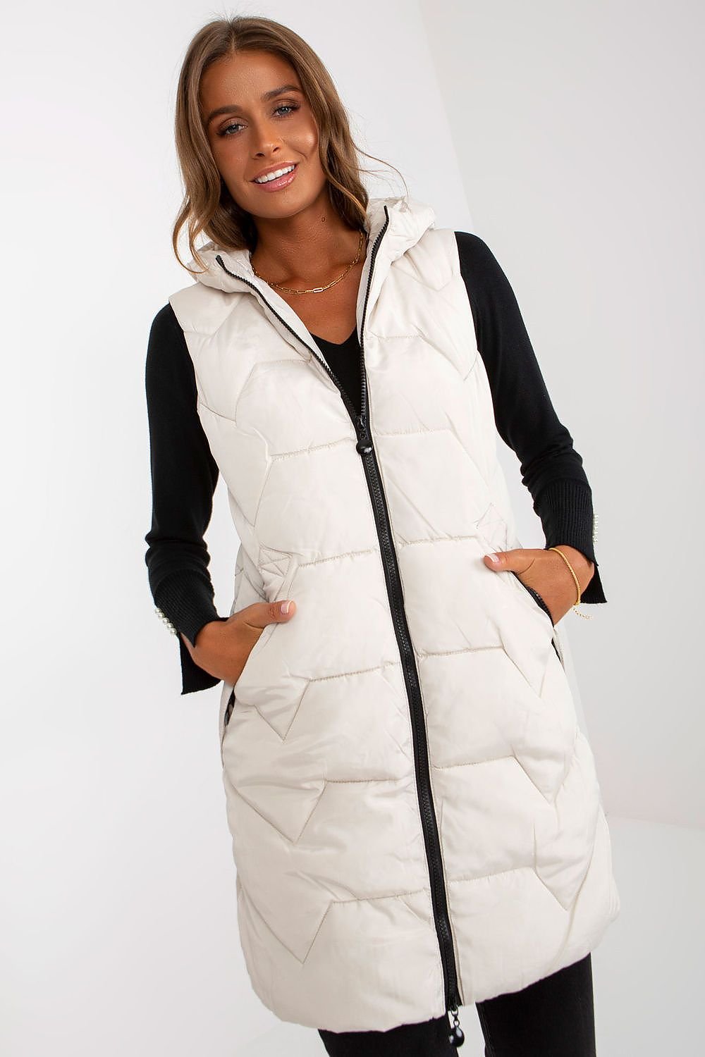 vest NM